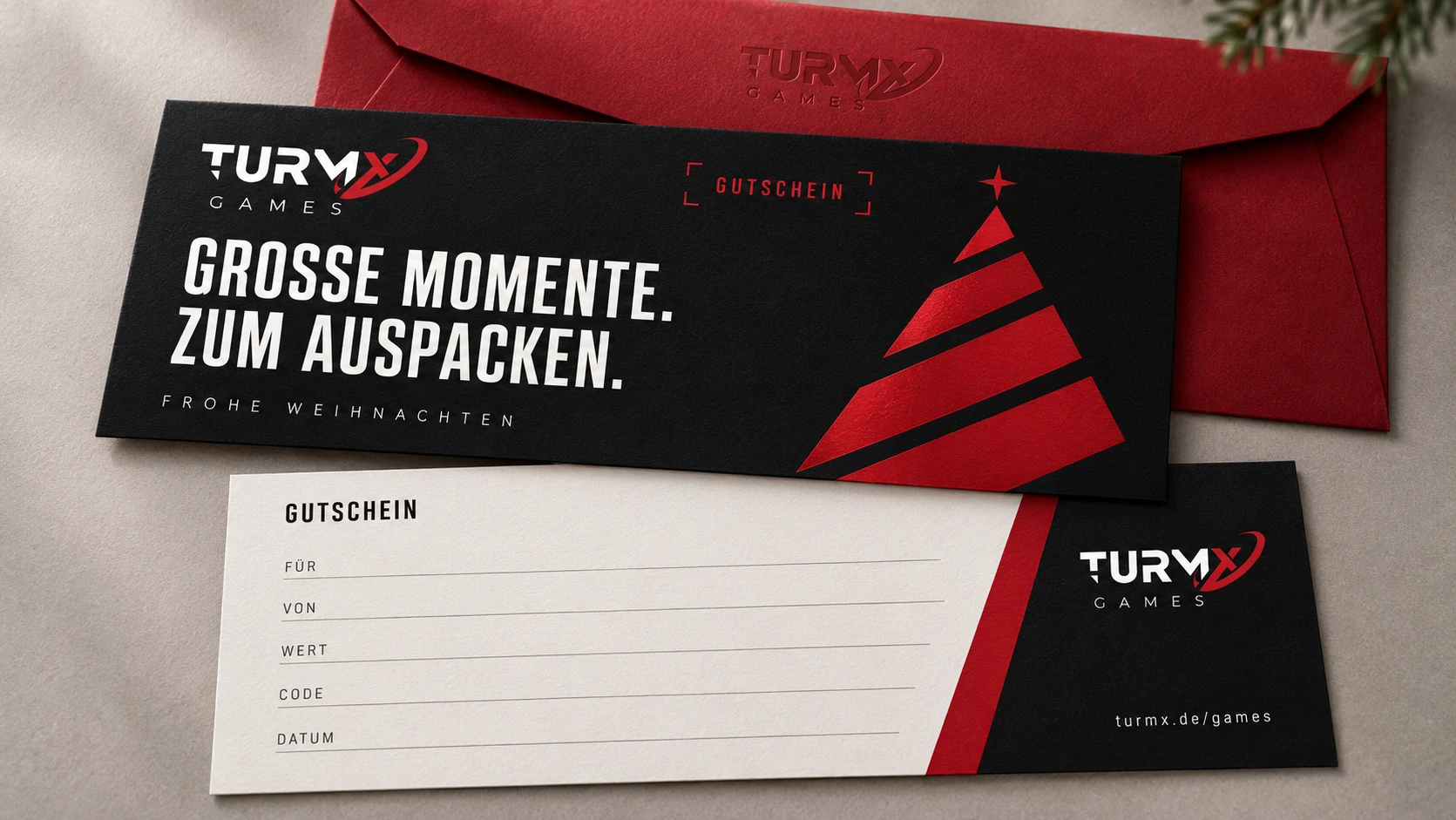 Gutscheinkarte von TurmX Games mit rotem Umschlag