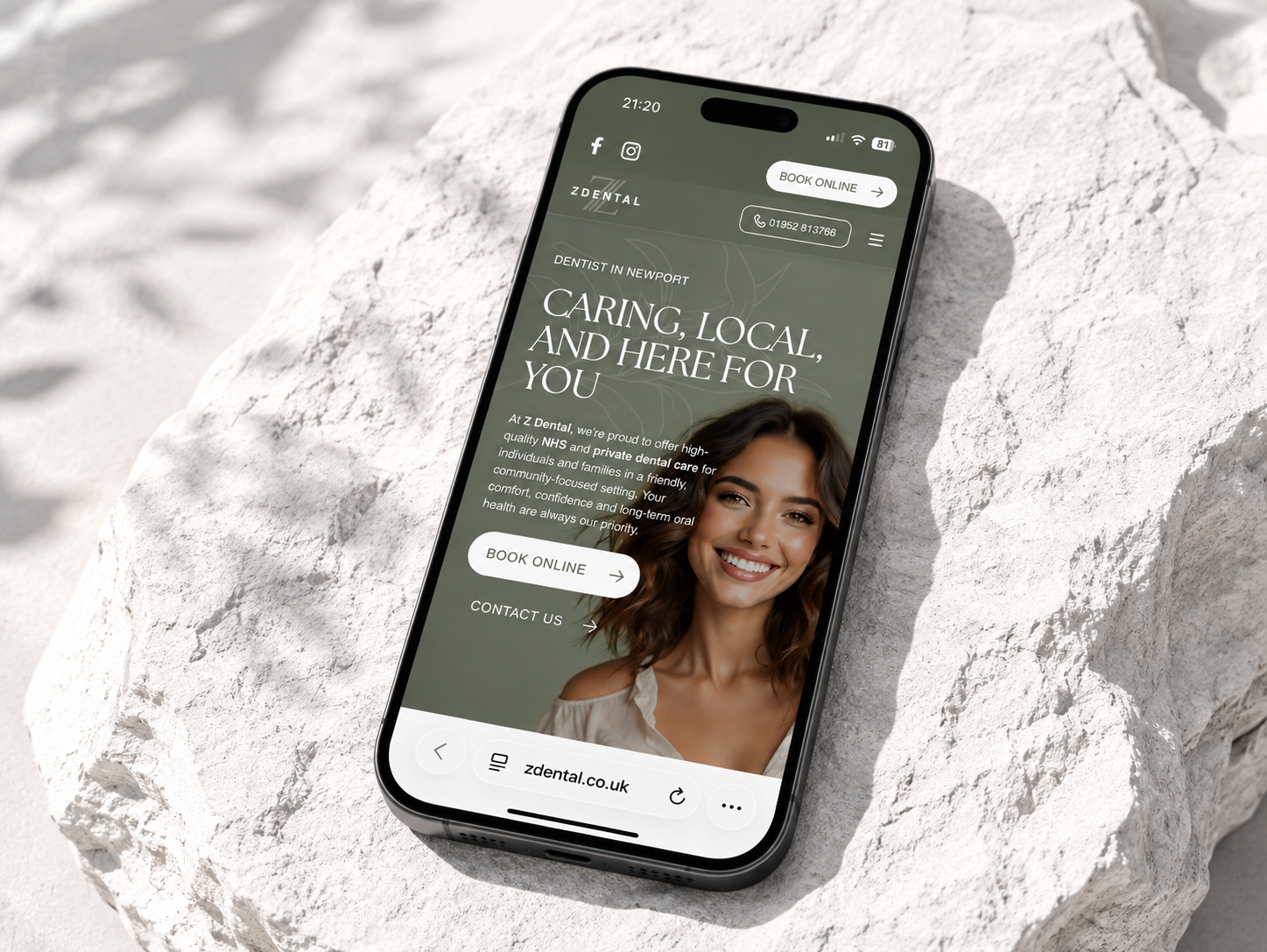 Z Dental mobile website displayed on pale stone