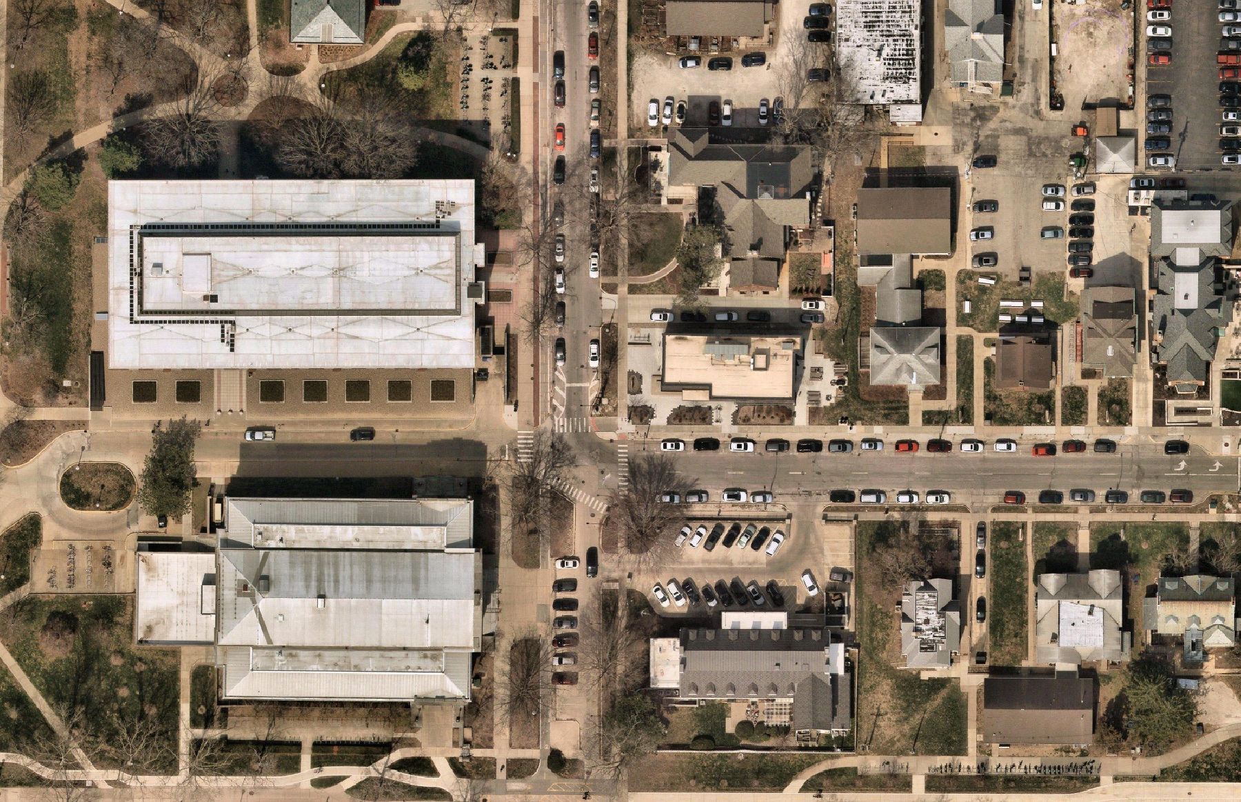 Aerial imagery of a commercial property with the takeoff boundary drawn around buildings, lawns, and parking