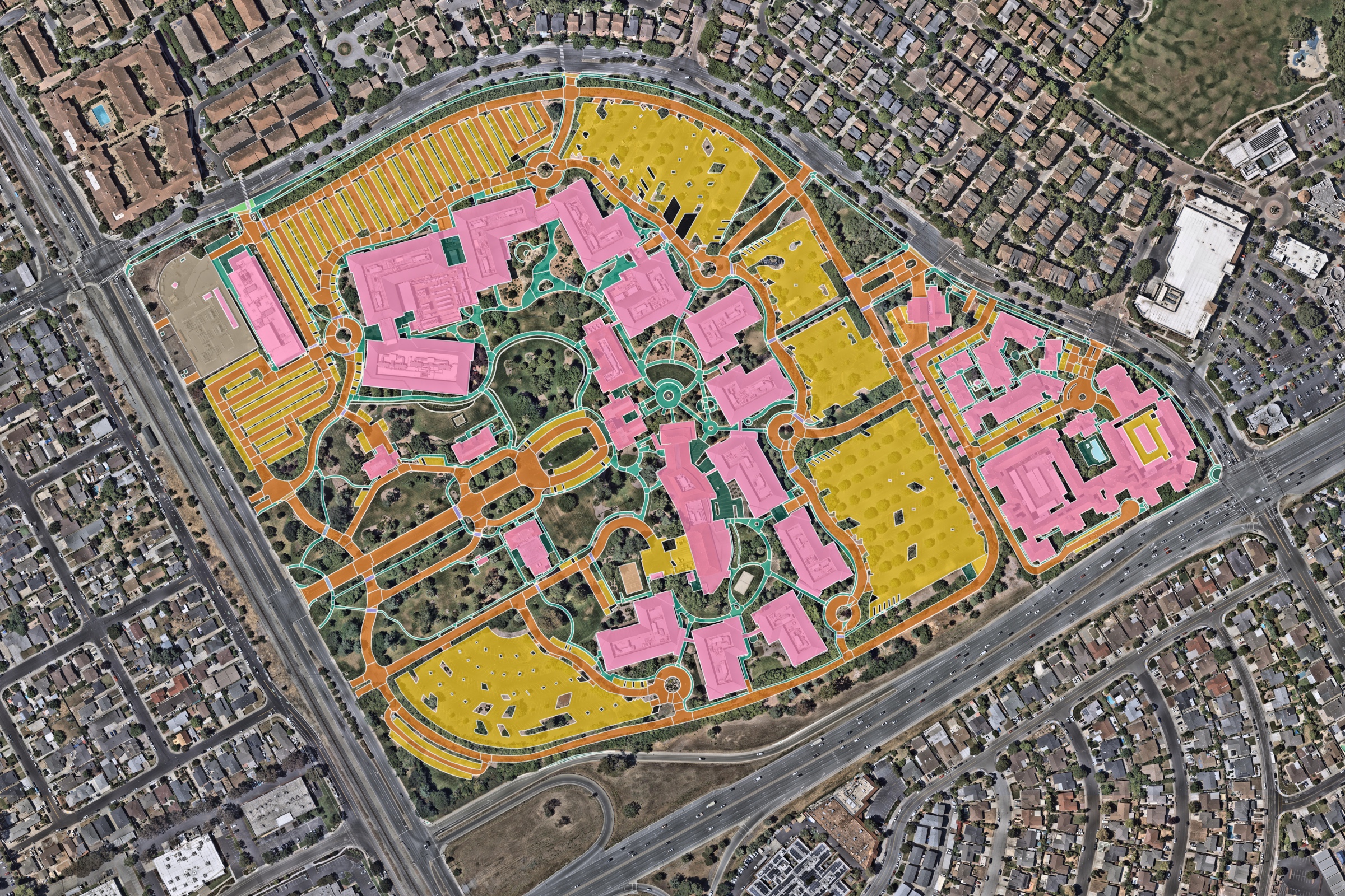 Paved and built surfaces measured from aerial imagery: buildings, parking lots, driveways, sidewalks, and pavement on a Santa Clara commercial campus