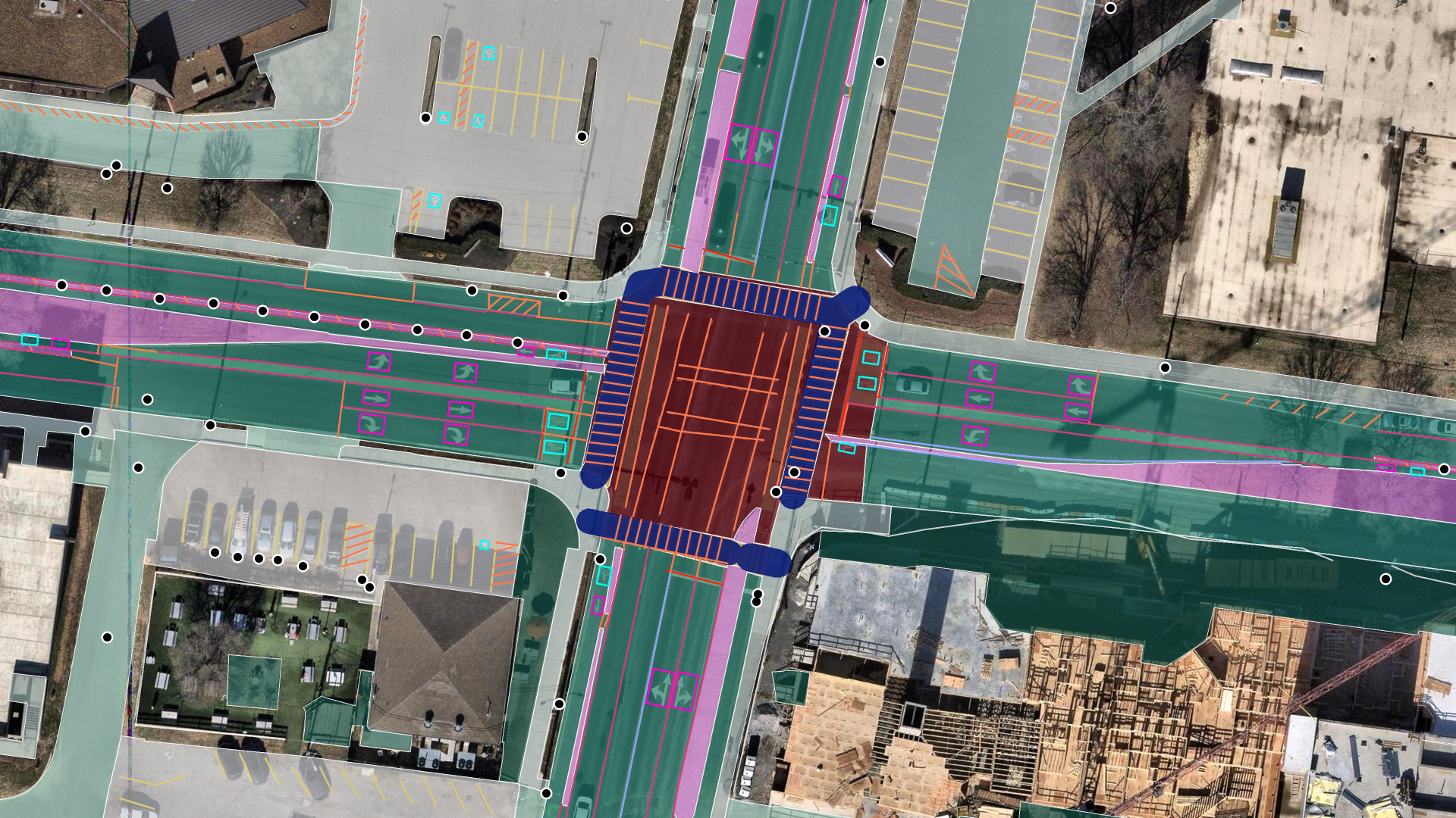 Advanced Transportation Features at a Nashville intersection: lanes, crosswalks, stop lines, turn arrows, and medians