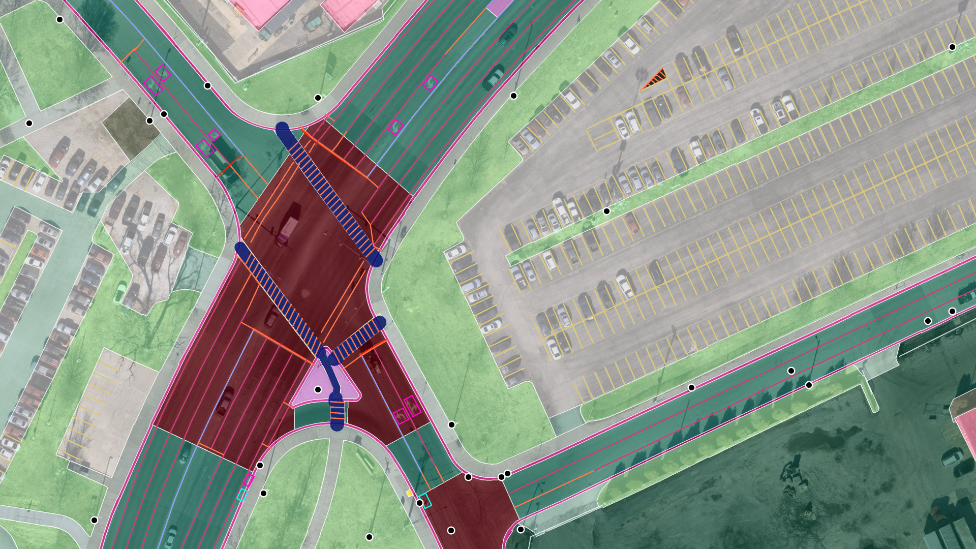 The same Nashville intersection as vector data: lanes, crosswalks, markings, parking lines, and land cover