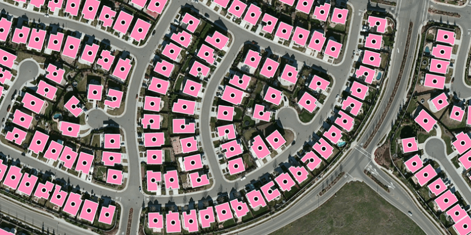 Residential neighborhood with every building footprint outlined and a rooftop geocode point on each home