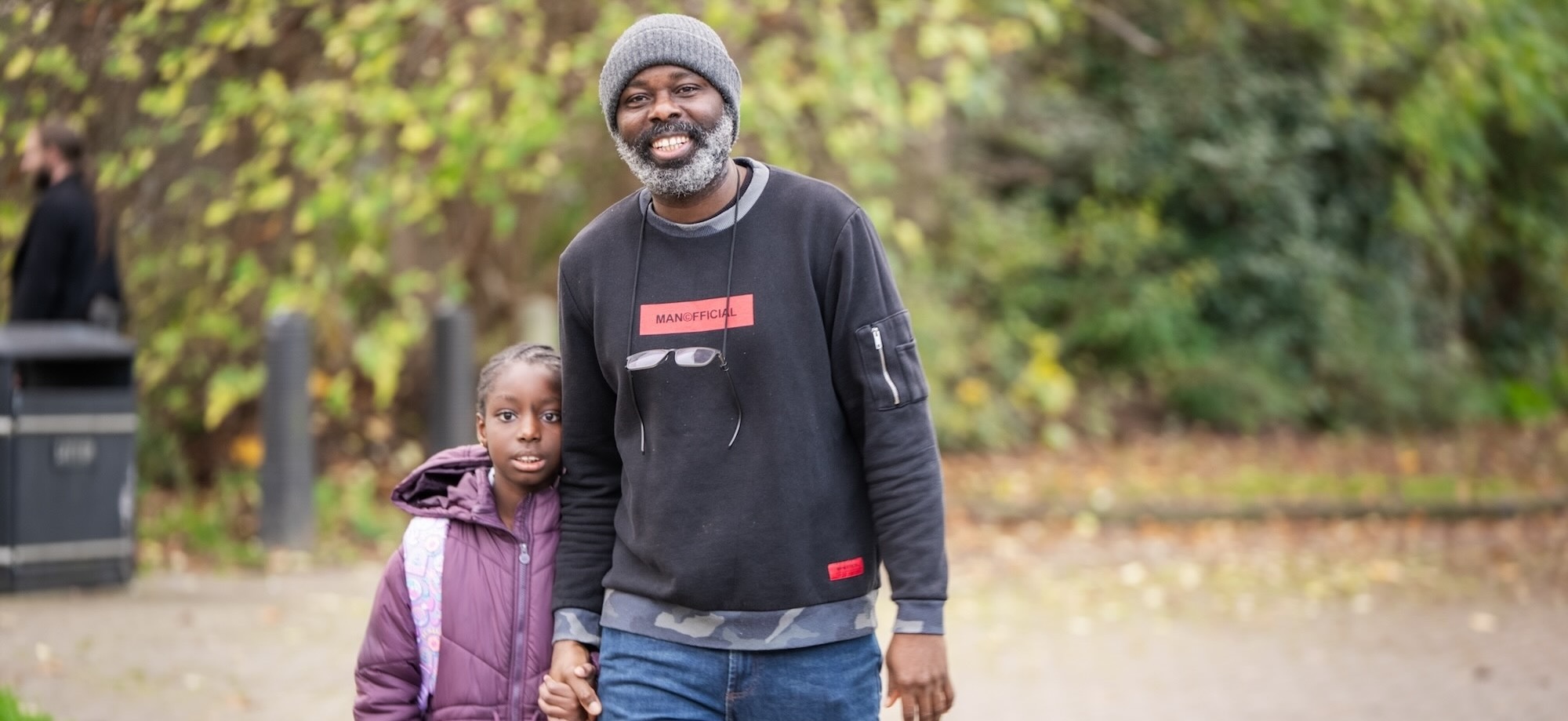 father and daughter walking