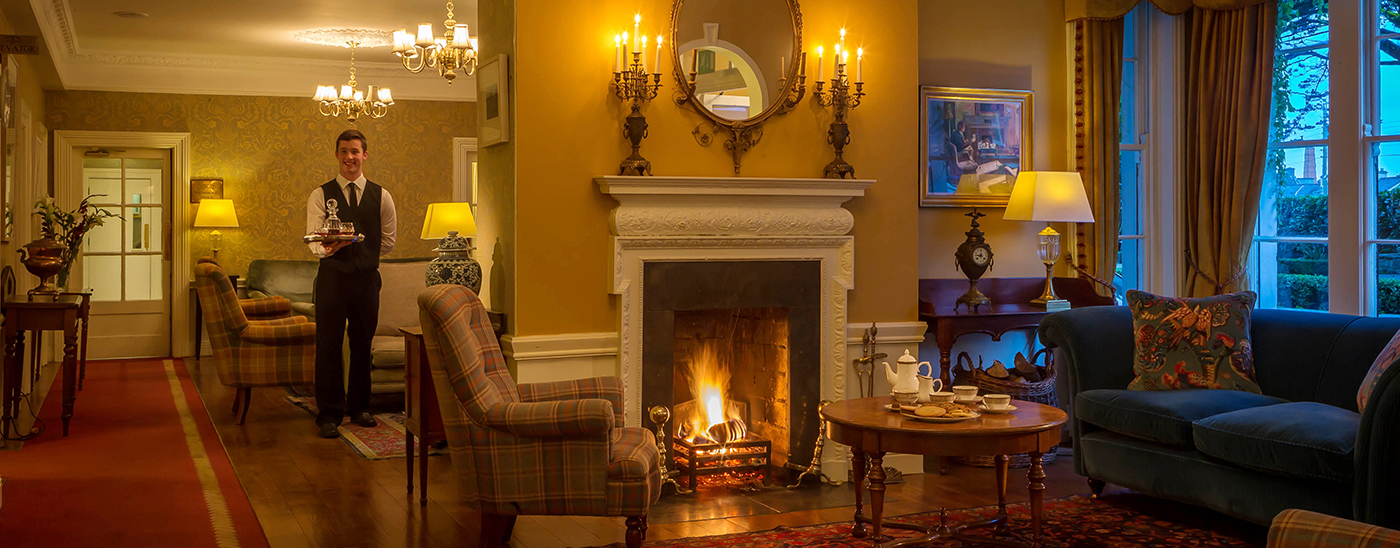 Waiter in Lobby for Old Ground Hotel - Lifestyle Photography © David Cantwell Photography