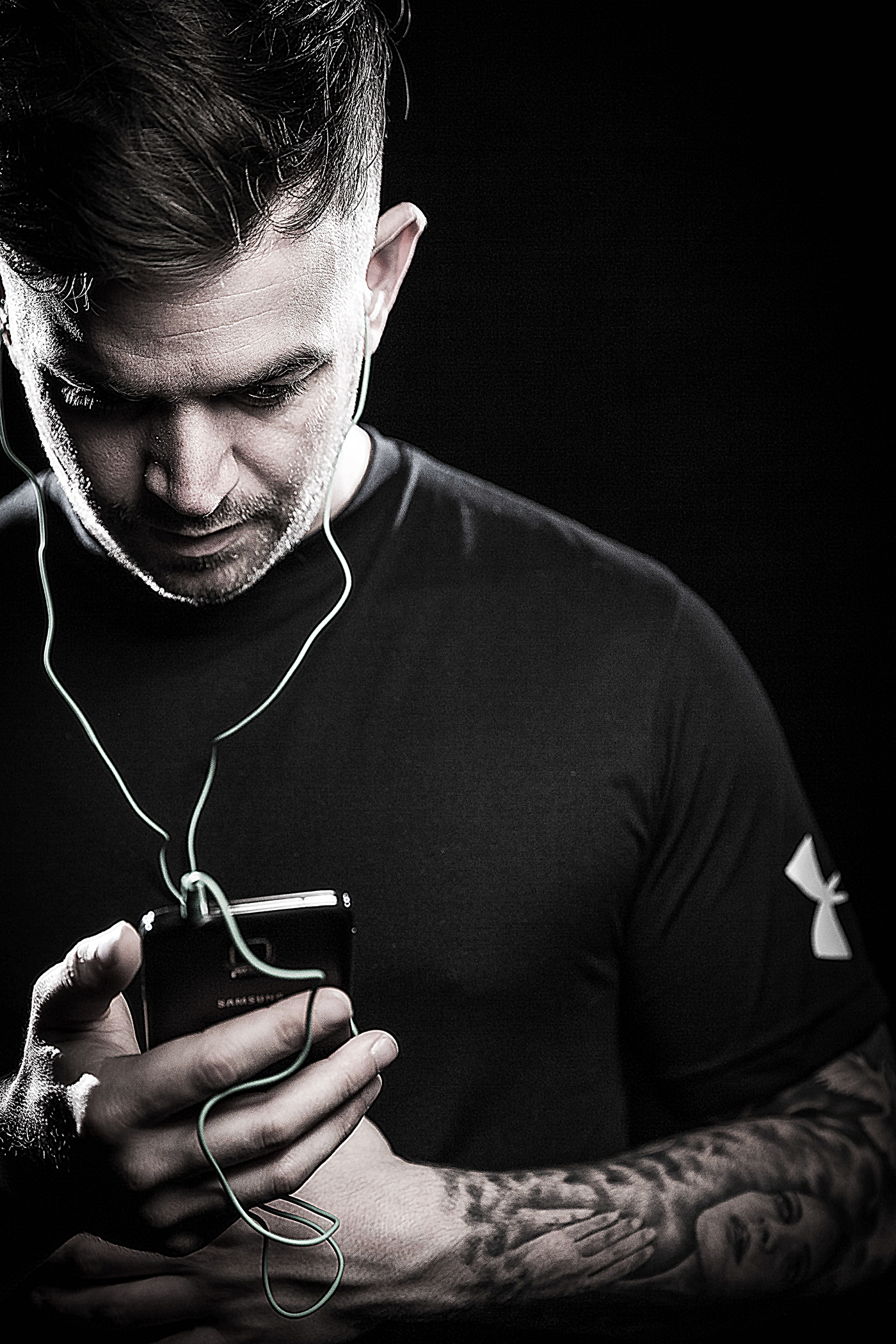 Man with Mobile and Earphones for Jivo - Lifestyle Photography © David Cantwell Photography