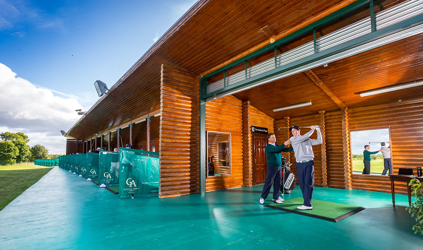 Instructor Giging a Golg Lesson on a Driving Range - Lifestyle Photography © David Cantwell Photography
