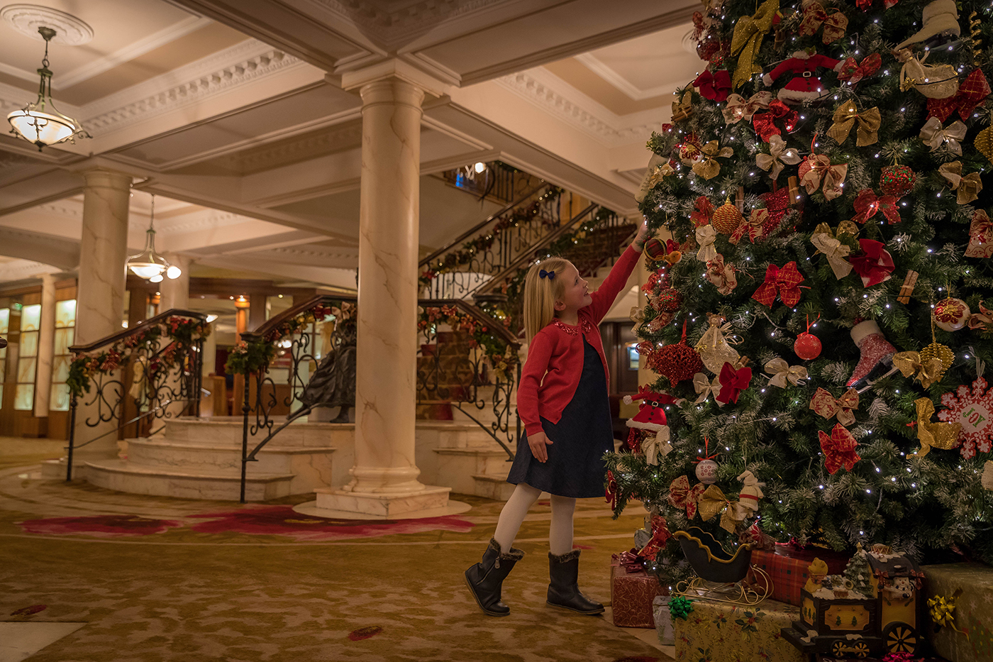 Girl @ Christmas Tree in Hotel Lobby  - Seasonal Commercial Photography © David Cantwell Photography