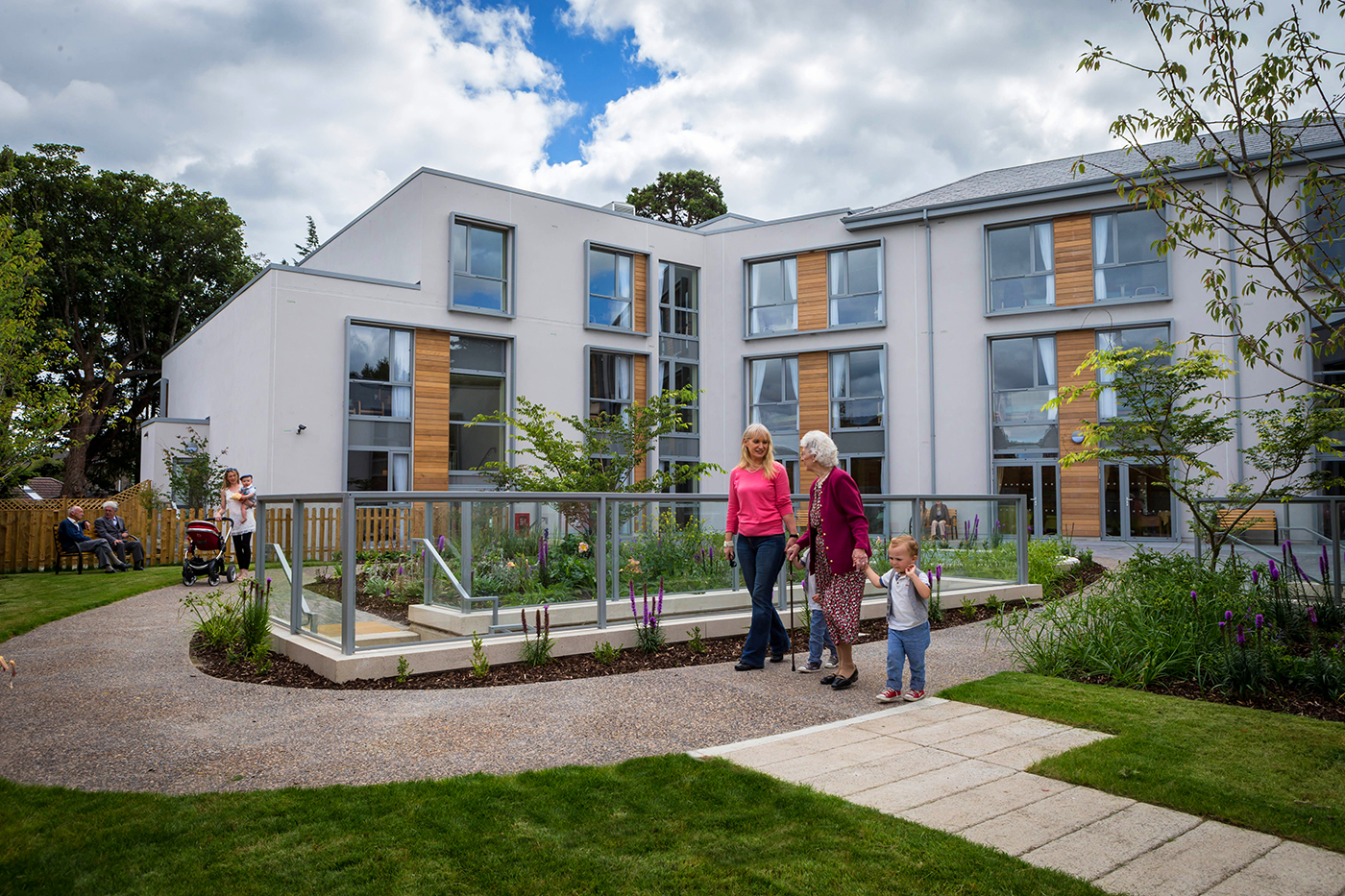 Grand Mother, Mother and Son Walking in Nursing Home - Family Lifestyle Photography © David Cantwell Photography