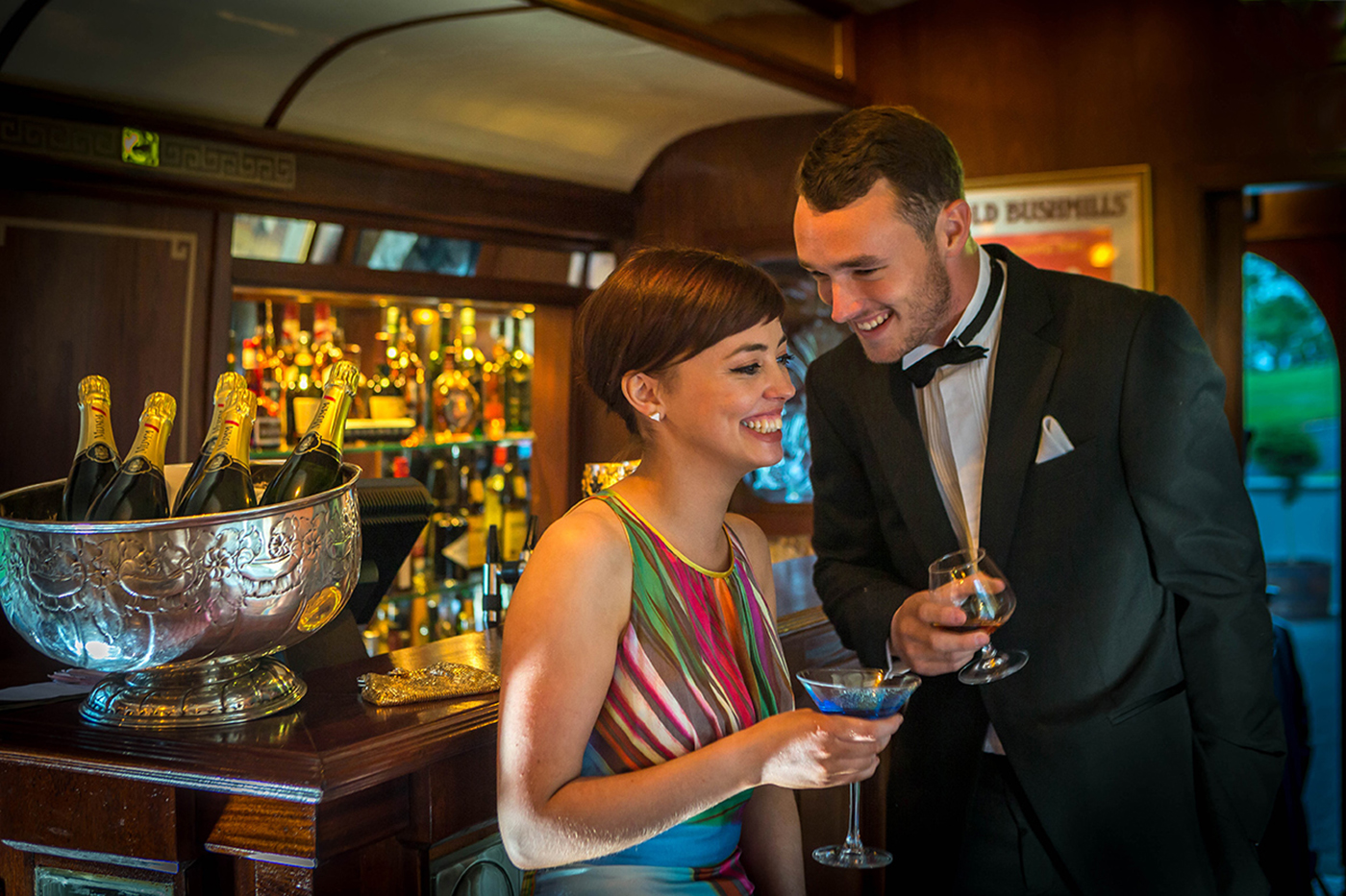 Couple Having Drinks In the Pullman Restaurant Formly the Orient Express Train Carraiges @ Glenlo Abbey Hotel © David Cantwell Photography