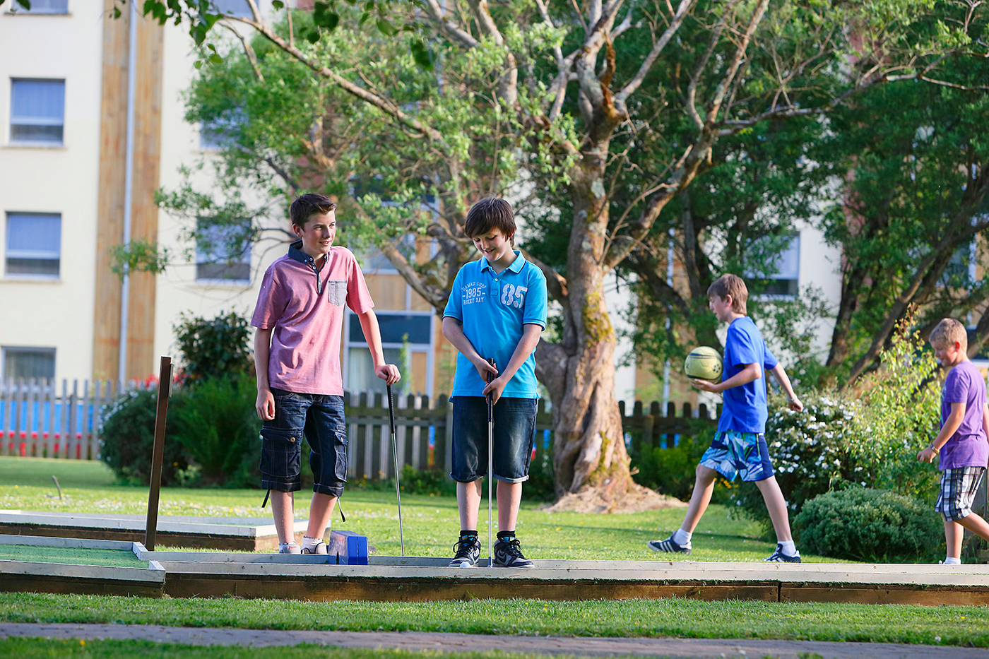 Boys Playing Mini Golf - Lifestyle Photography © David Cantwell Photography