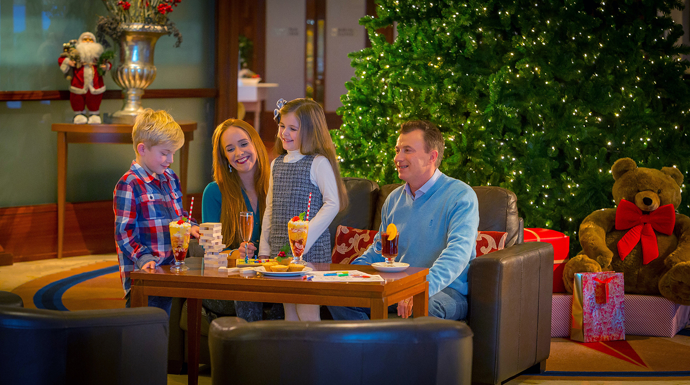Family Having Christmas Treats in The Lobby of Shearwater Hotel @ Christmas © David Cantwell Photography