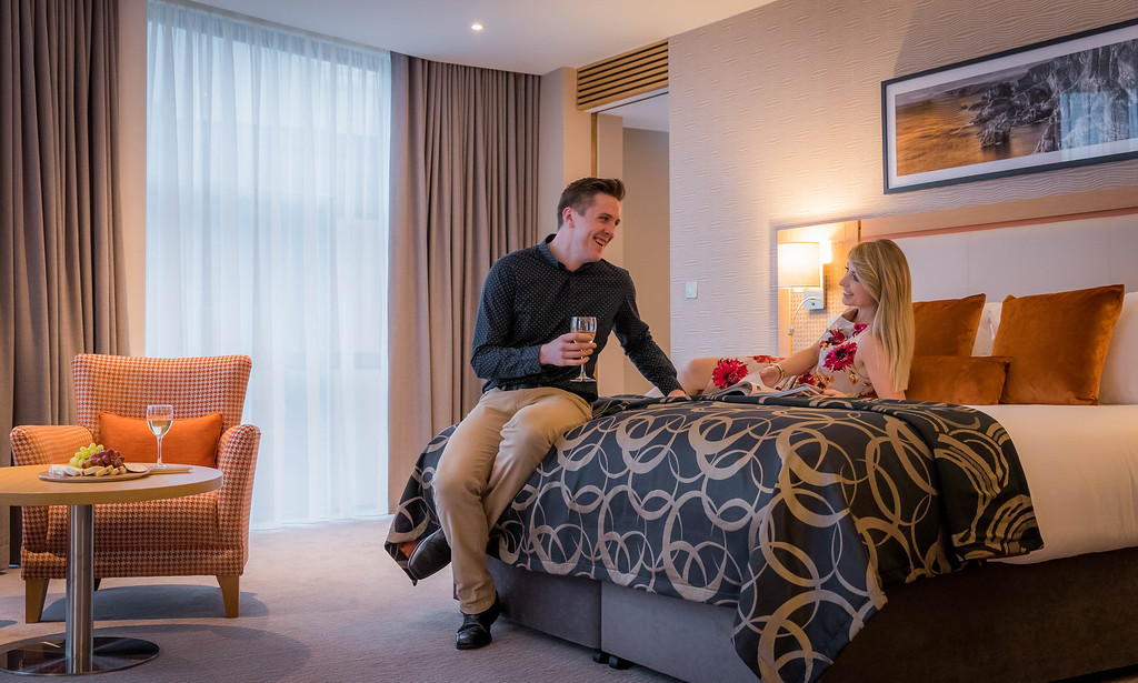 Couple in Bedroom - Hotel Photographer © David Cantwell Photography