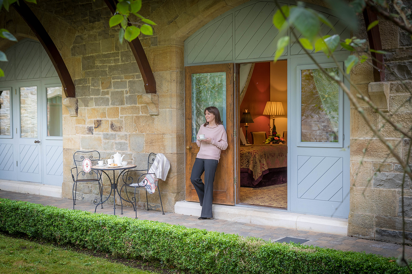 Female Guest in Courtyard Bedroom @ Lough Rynn Hotel © David Cantwell Photography