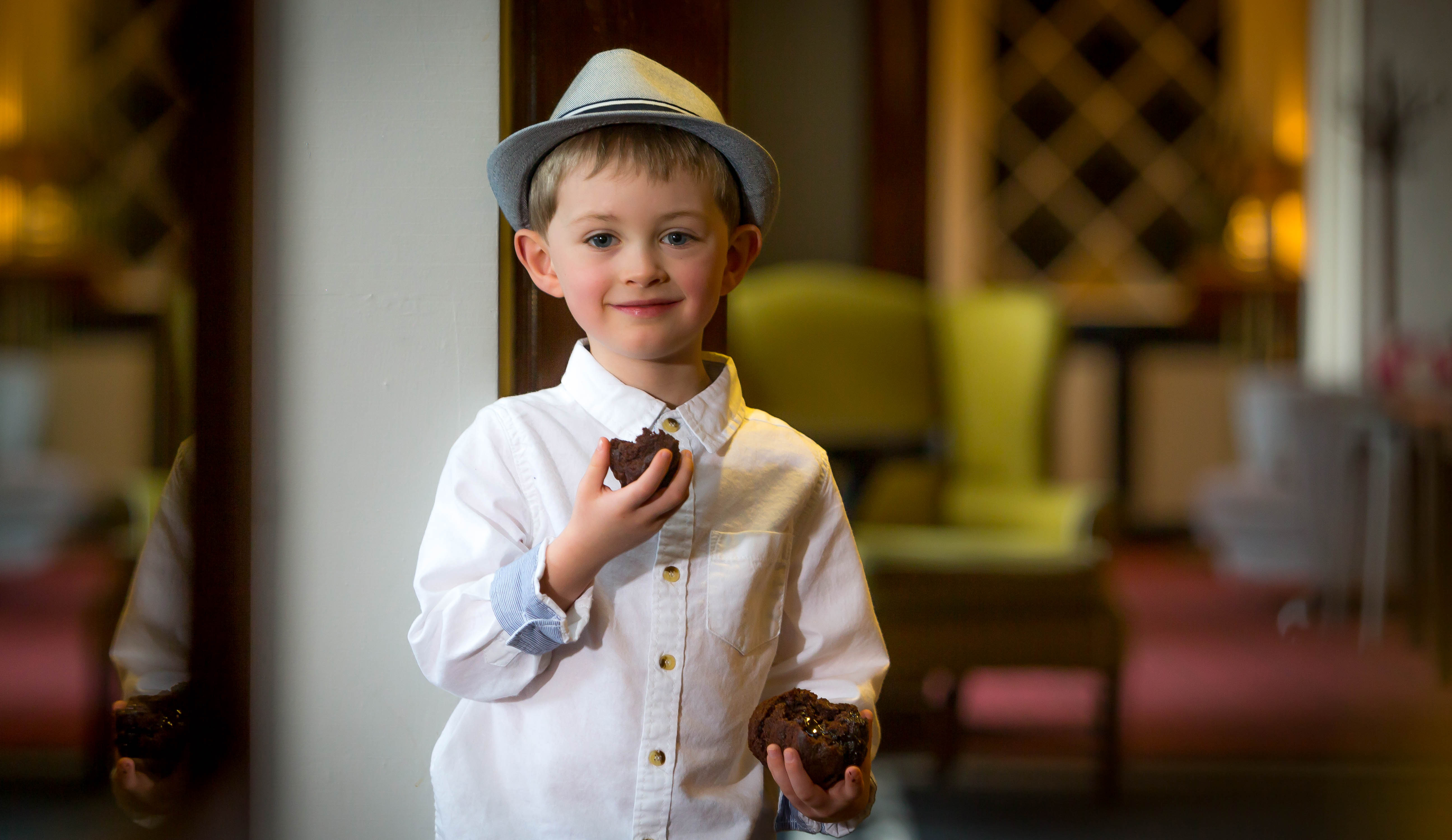 Boy Eating a Muffin @ Castletroy Park Hotel © David Cantwell Photography