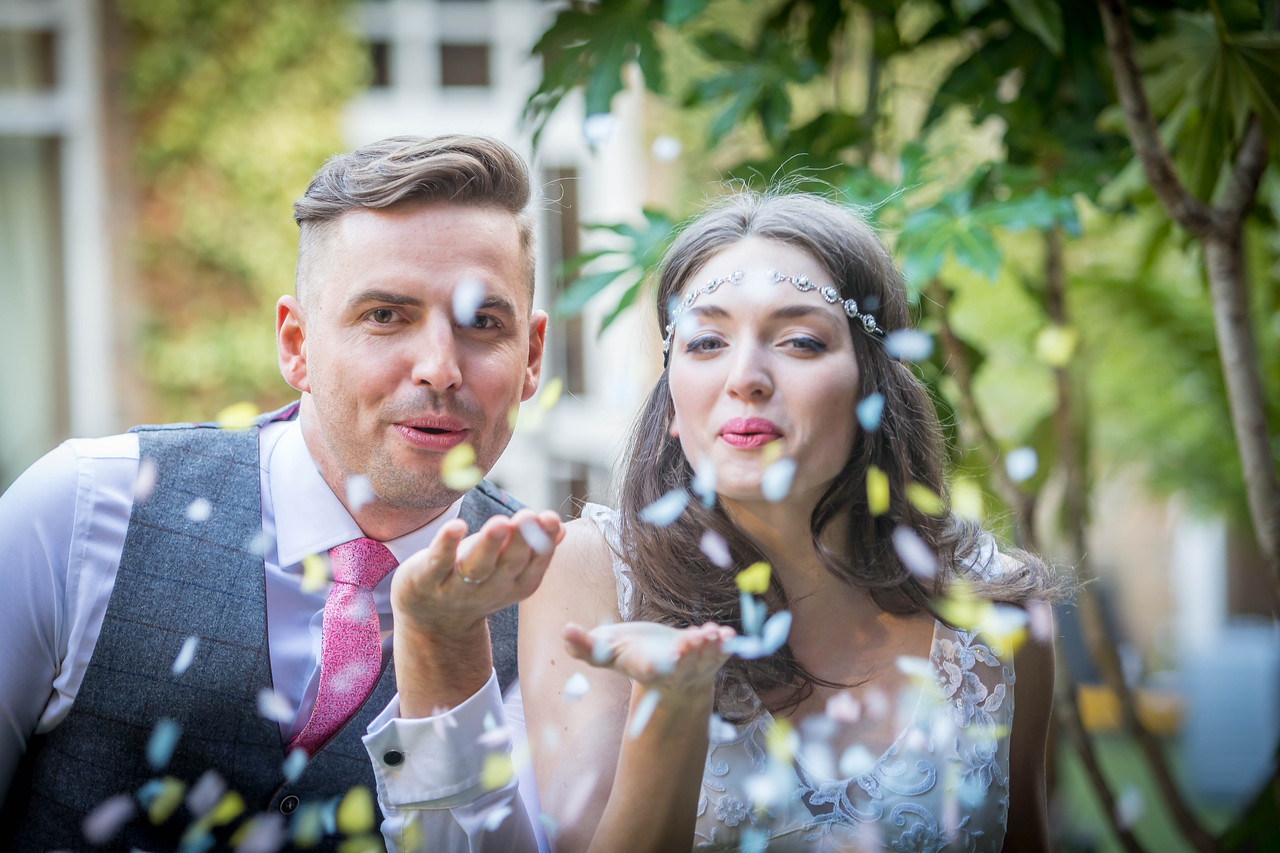 Bride & Groom with Confetti - Hotel Lifestyle Photography © David Cantwell Photography