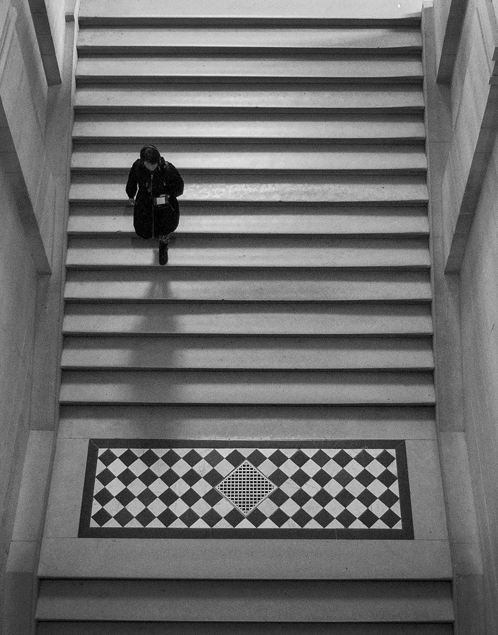 B & W Woman on the Steps of The Louvre - Lifestyle Photography © David Cantwell Photography