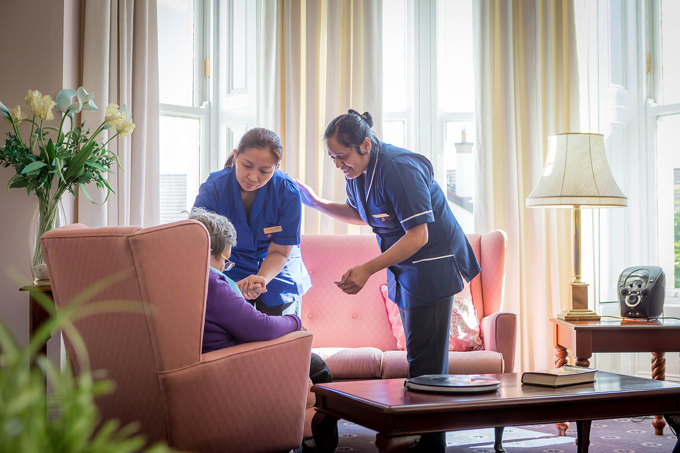 Nurses with Elderly Resident in a Nursing Home © David Cantwell Photography