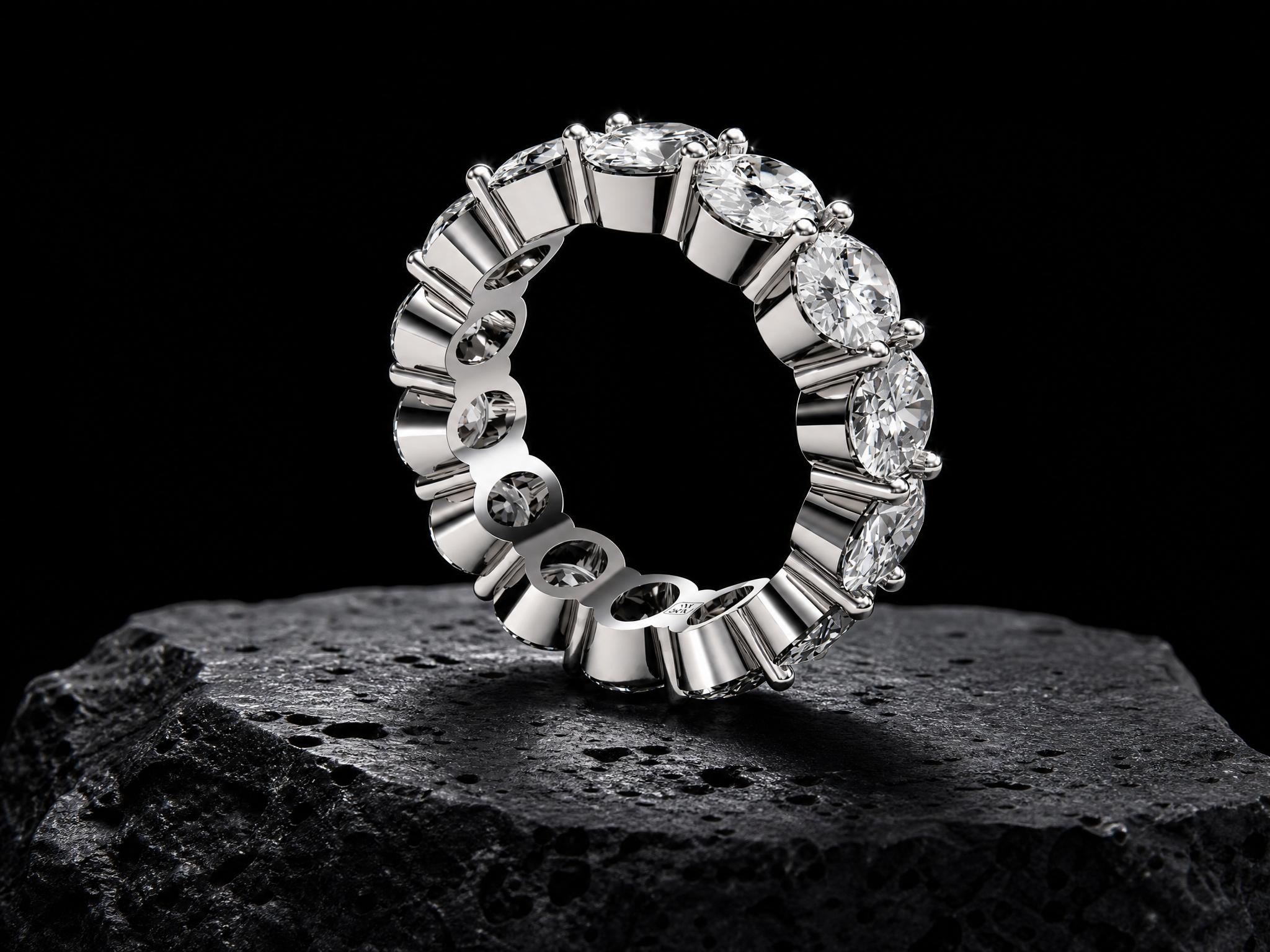 18k white gold eternity ring from the ORBIT SERIES, fully set with 14 oval-cut lab-grown diamonds (9.94 ct total weight).