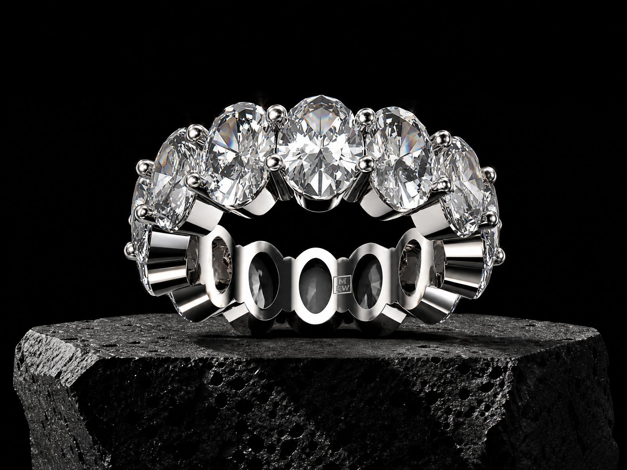 18k white gold eternity ring from the ORBIT SERIES, fully set with 14 oval-cut lab-grown diamonds (9.94 ct total weight).