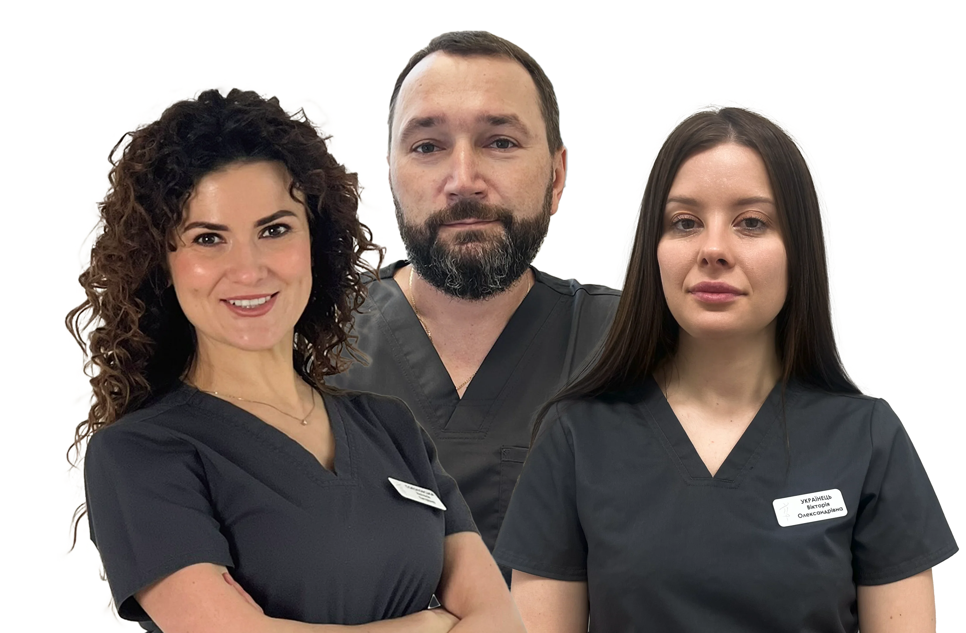 Three healthcare professionals wearing dark scrubs and name tags standing against a white background, two women flanking a bearded man.