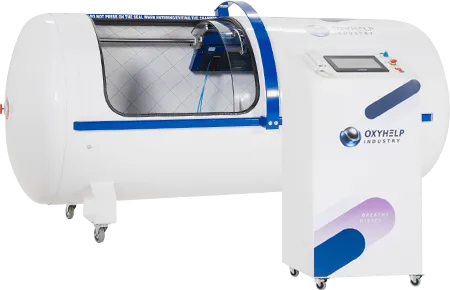 Commercial hyperbaric oxygen therapy chamber with control panel and blue accents.