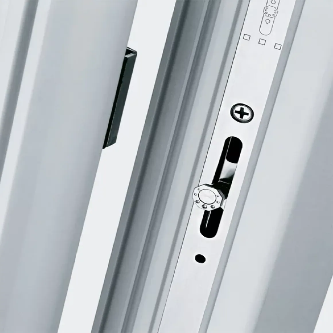 Close-up of a metallic lock mechanism on a white door frame.