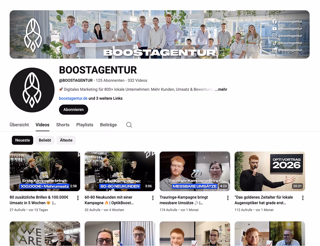 YouTube-Kanalseite der BOOSTAGENTUR mit Teamfoto im Banner, Logo links und mehreren Videovorschauen im Feed.