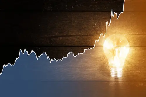 a graph showing peaks over a lightbulb
