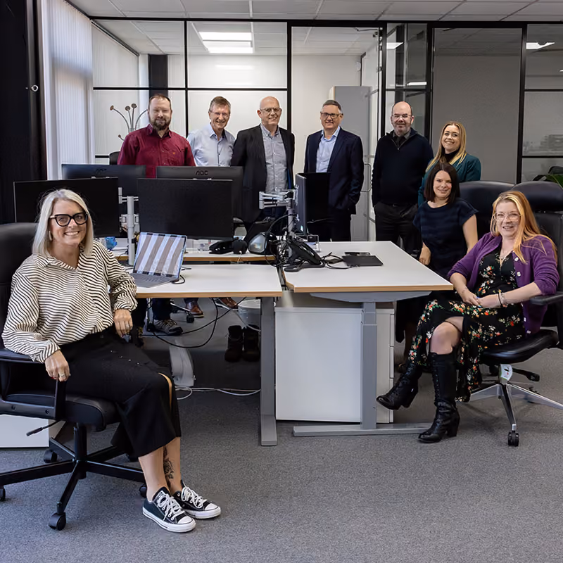 Eximia broking team in the office