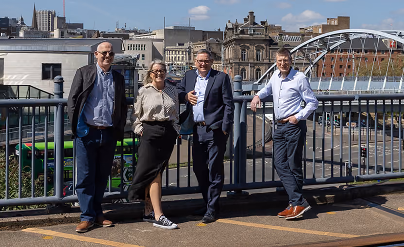 Eximia team overlooking the city