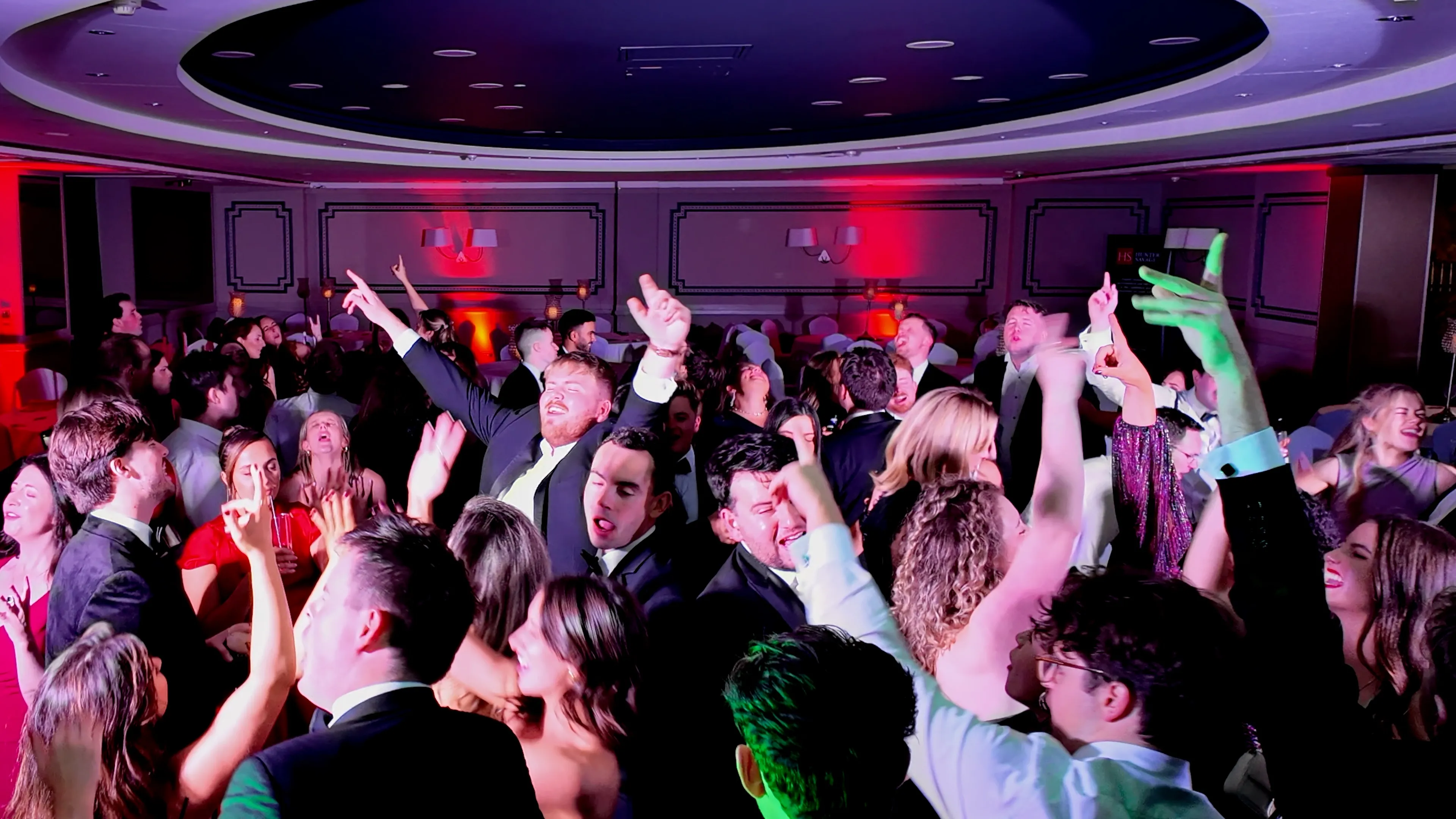 Packed dance floor with hands in the air — Brian Hennessy DJ