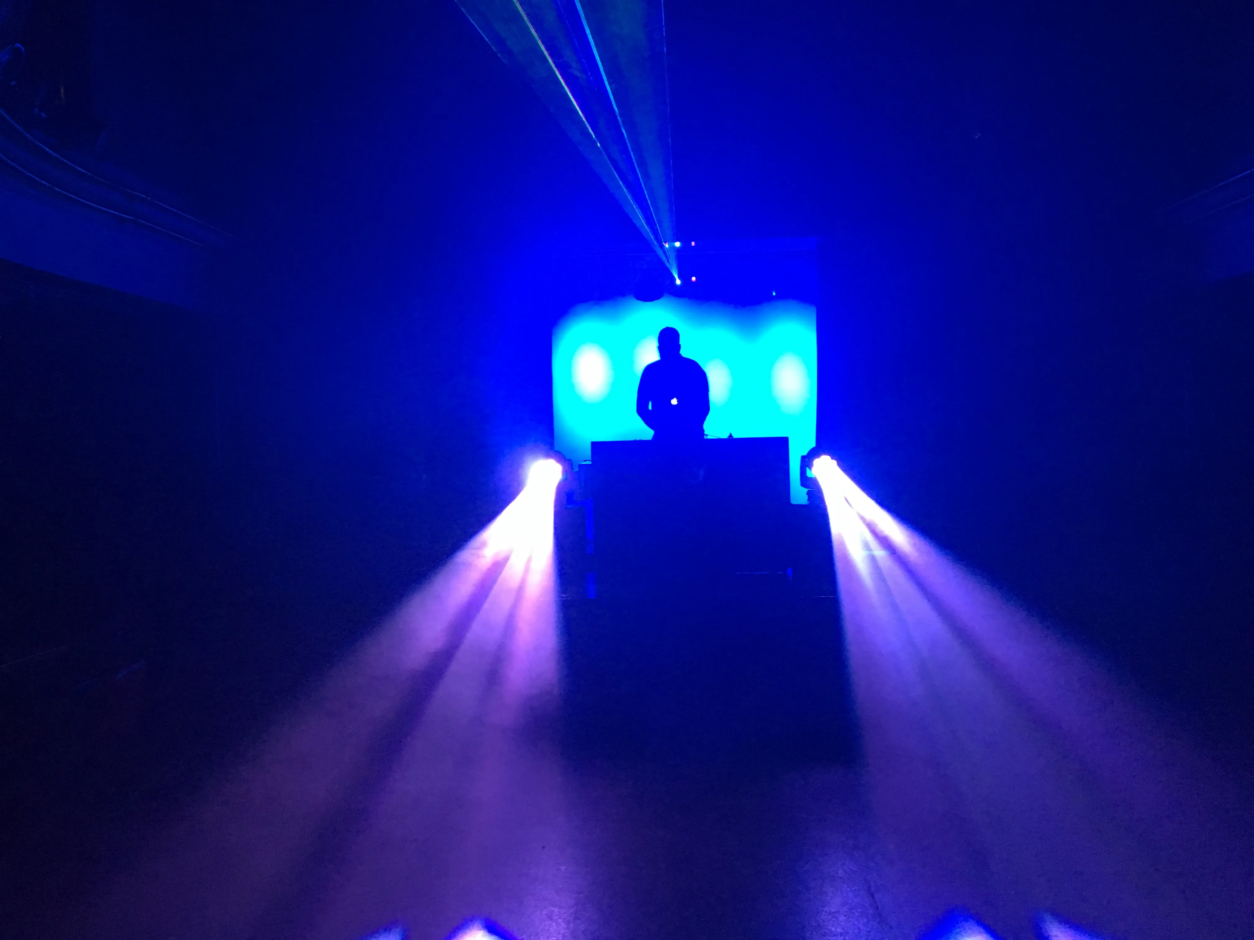 Brian Hennessy performing for guests at an indoor event