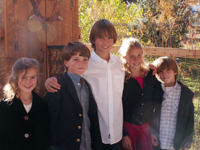 Cousins dressed up before a bar mitzvah