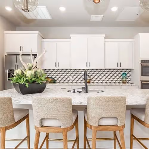 Residence lounge kitchen with bar and stools