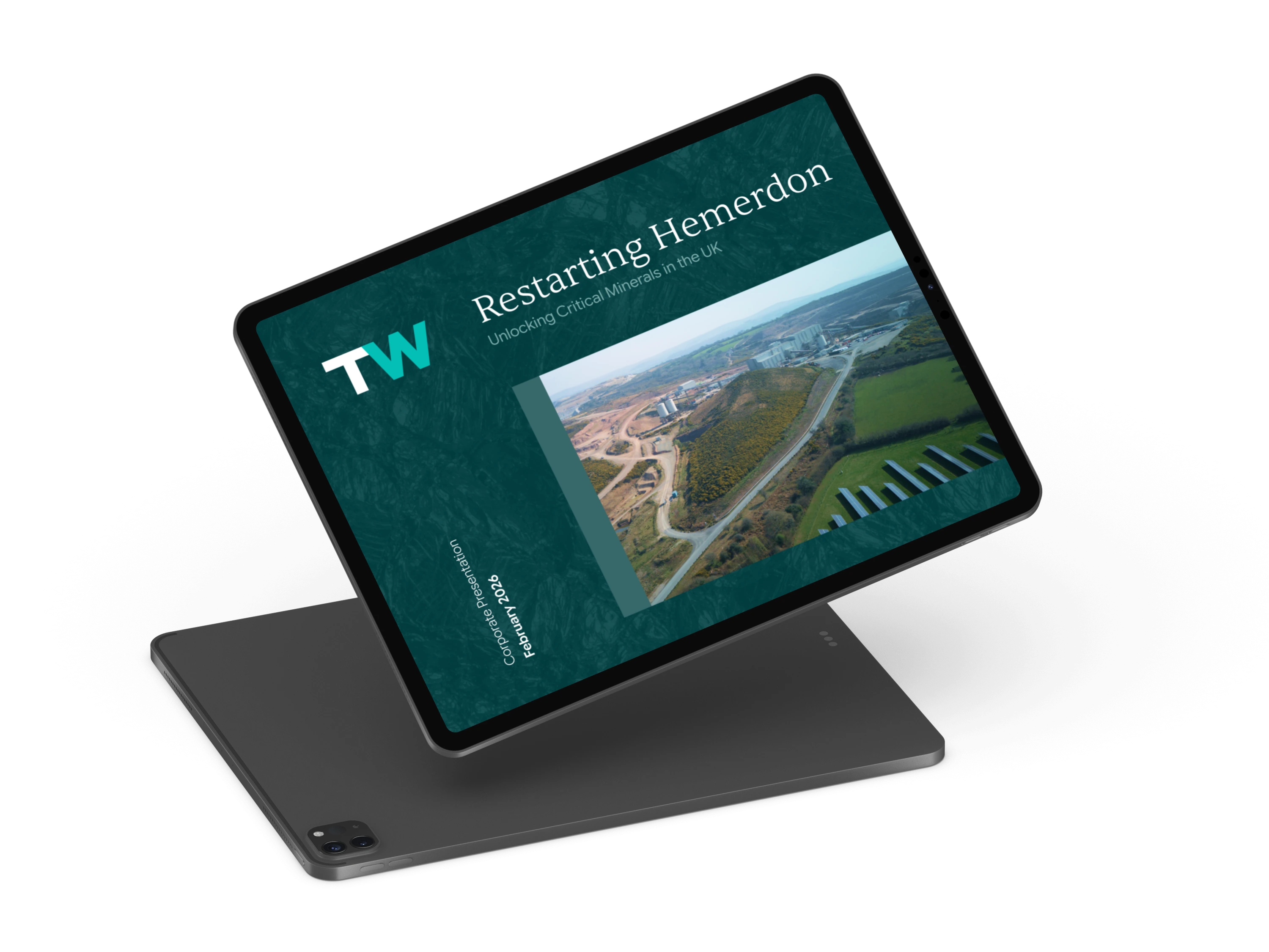 Tablet displaying a presentation titled 'Restarting Hemerdon' with an aerial view of a mining site.