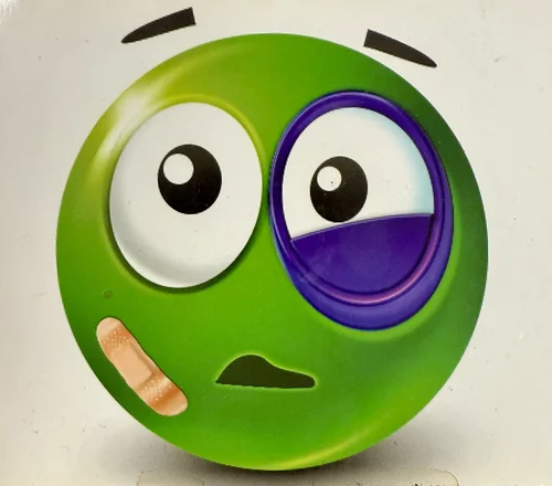 Green emoji face with black eye and bandage on cheek