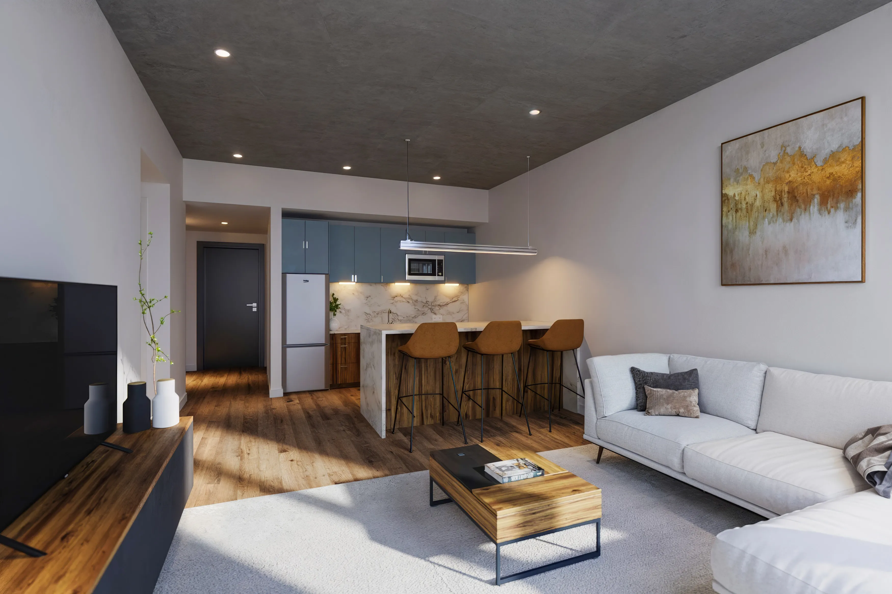 Modern open-plan living room with a light gray sofa, wooden coffee table, and kitchen island with three brown bar stools under pendant lighting.