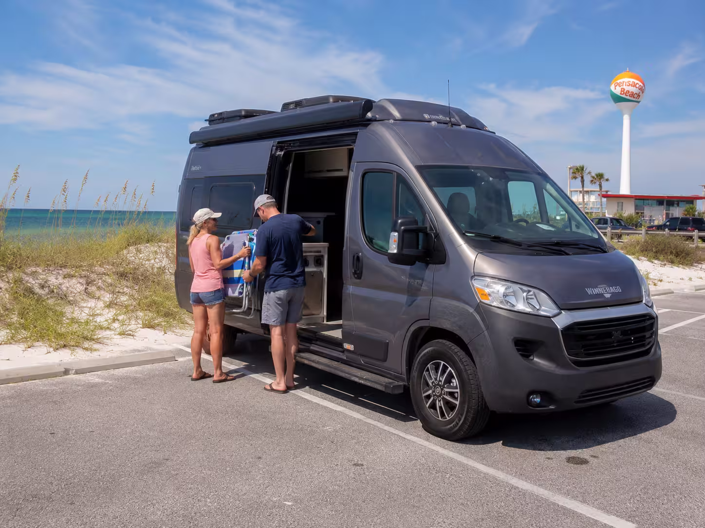 Small camper van parked at Pensacola Beach