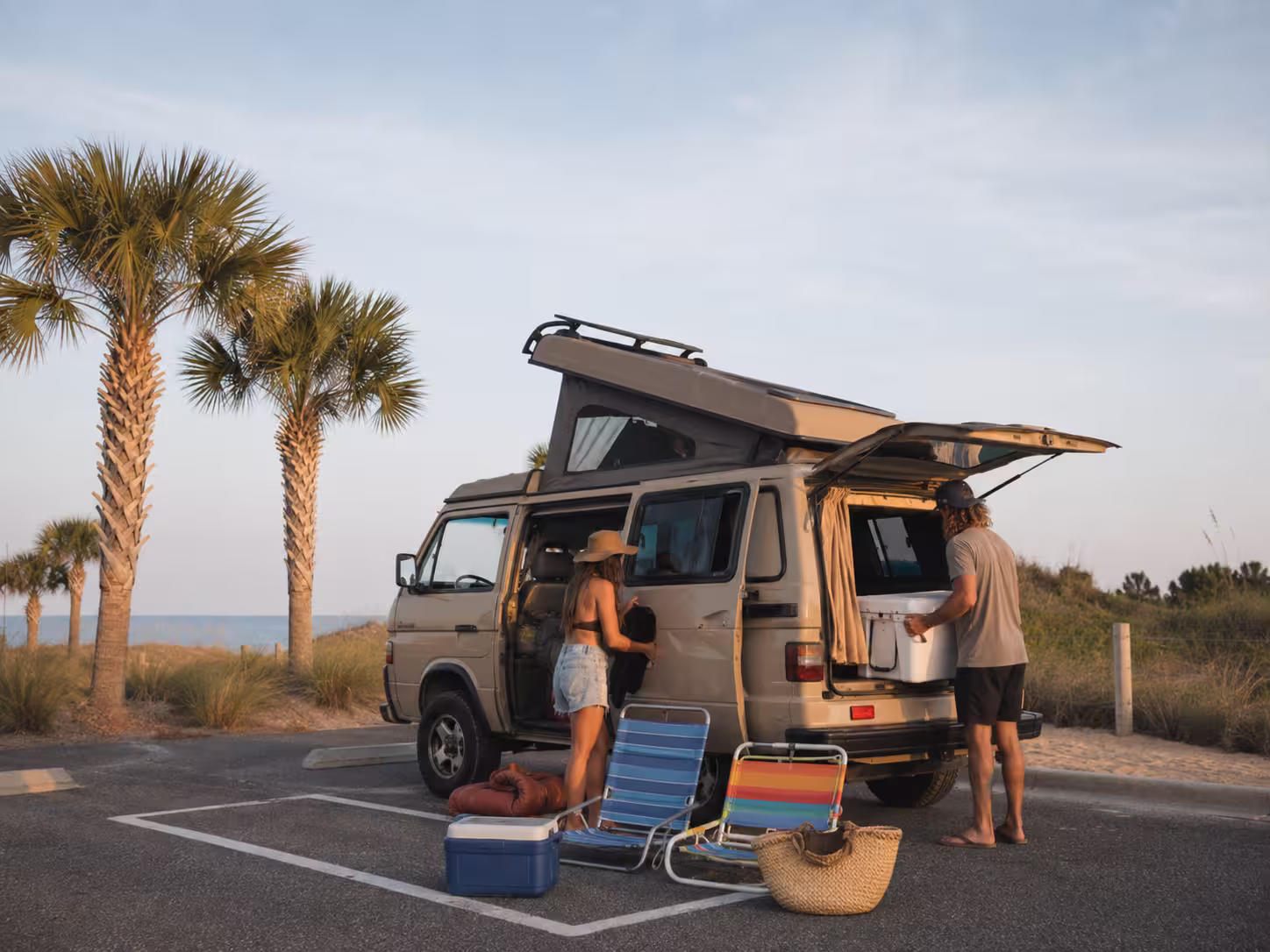 Couple packing a camper van near Perdido Key