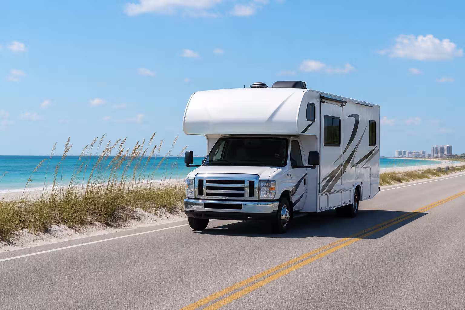 Class C motorhome driving a Pensacola coastal road