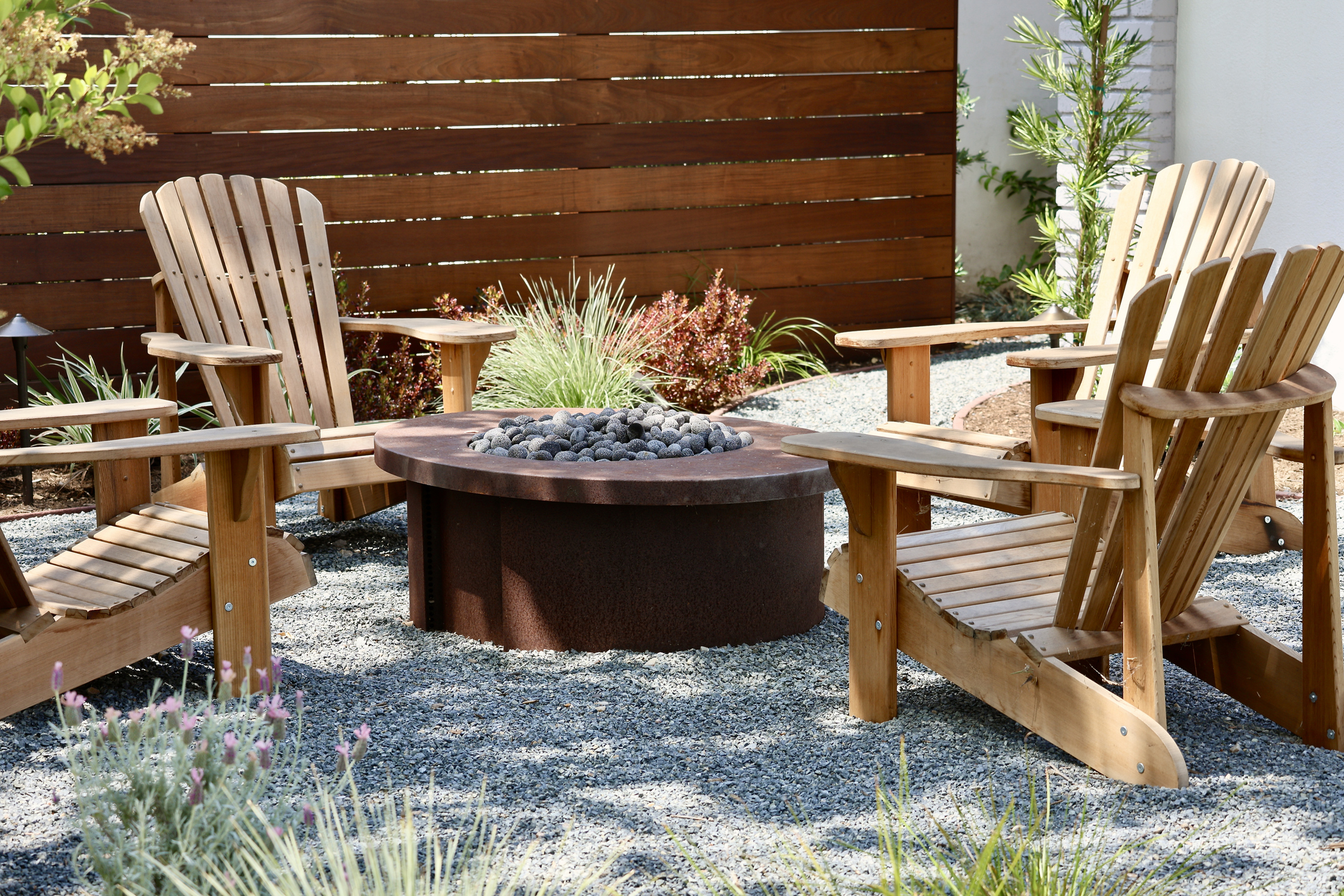 Custom outdoor fire pit seating area — Birmingham AL hardscape design by Wood- Palmer