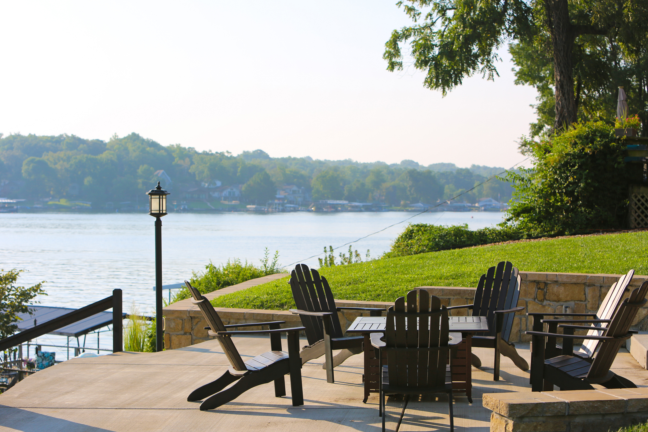 Outdoor living space on Central Alabama lake property — hardscape and landscape design