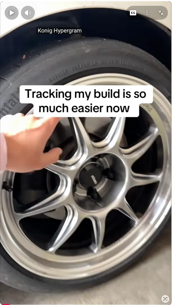 Hand pointing at a silver Konig Hypergram car wheel with text saying tracking build is easier now.