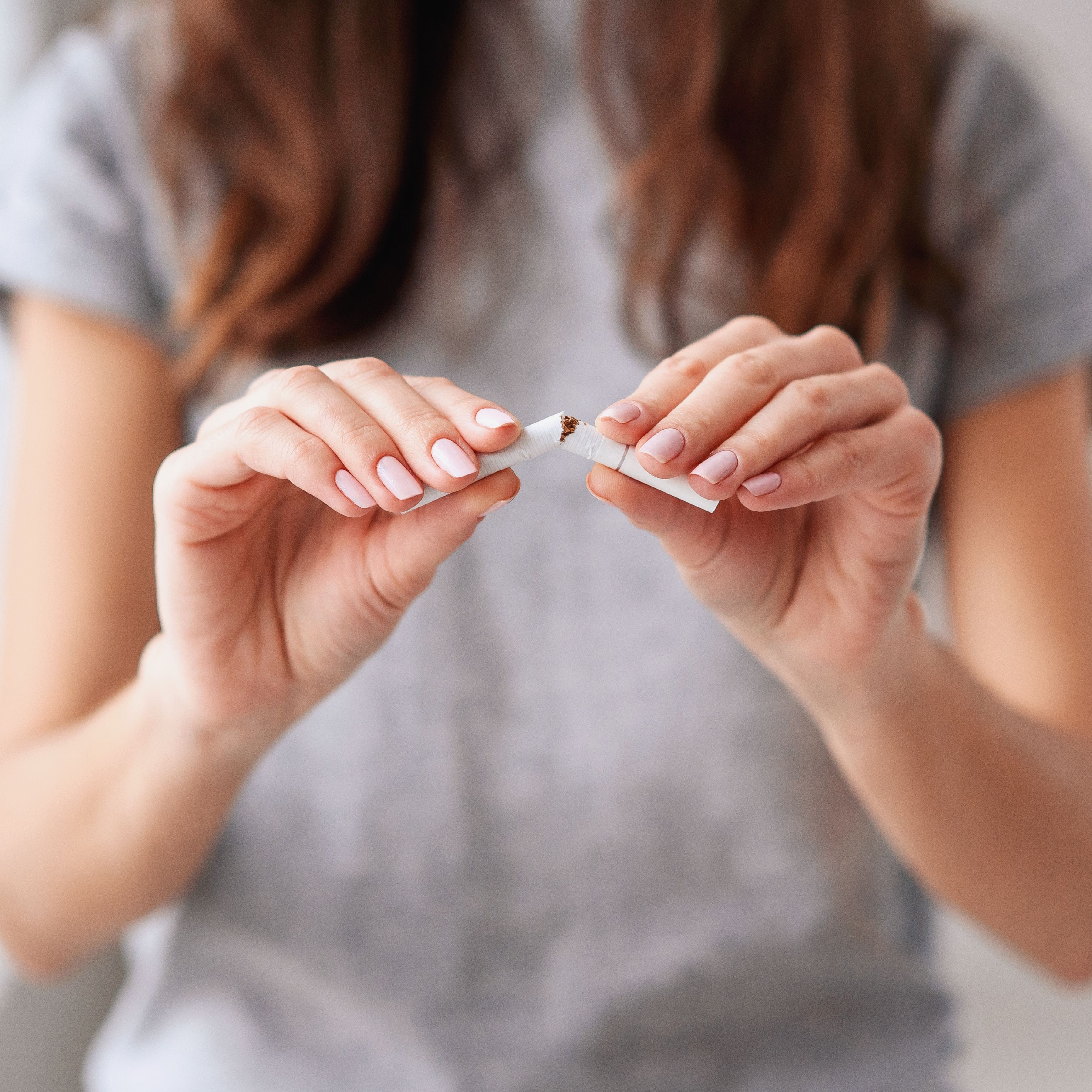 Person breaking free from smoking