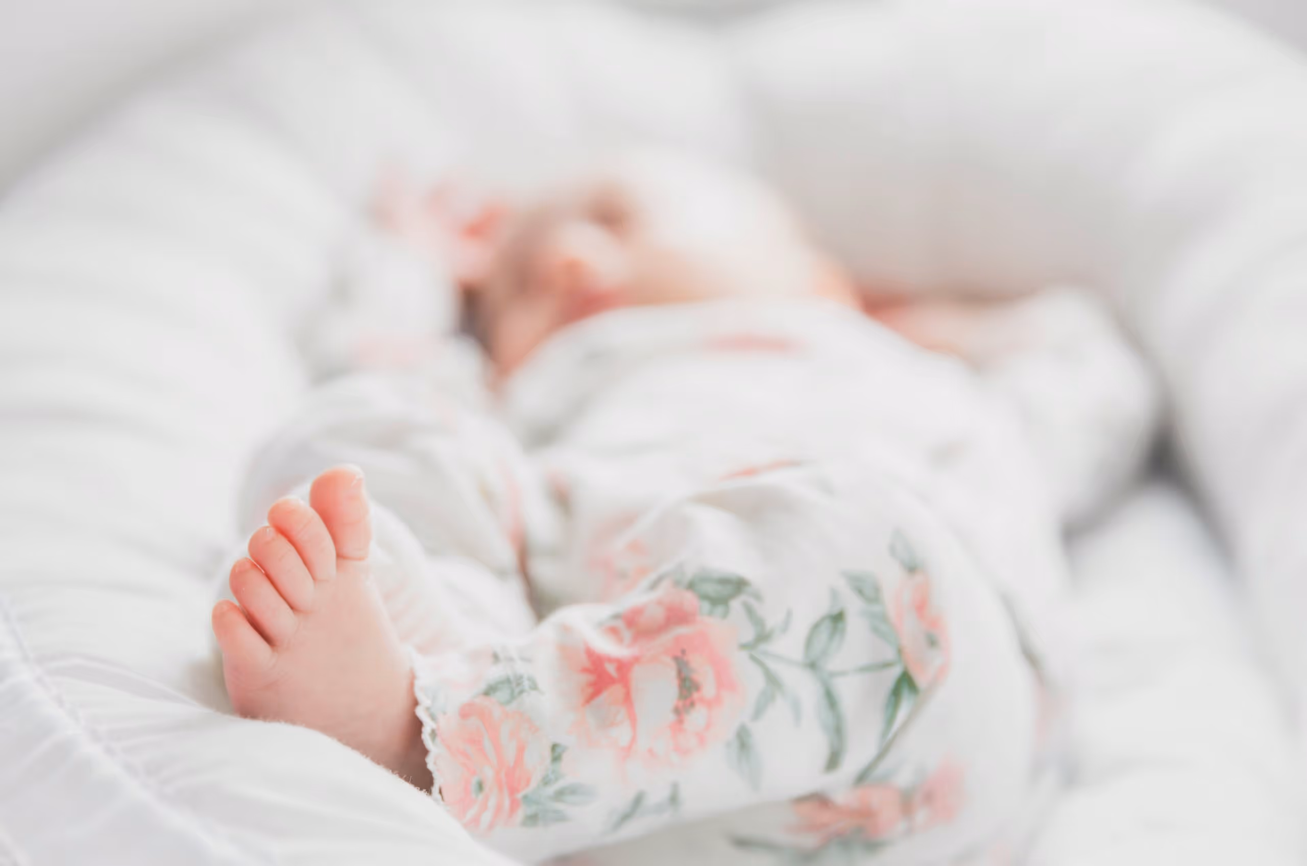 A newborn, yawning.