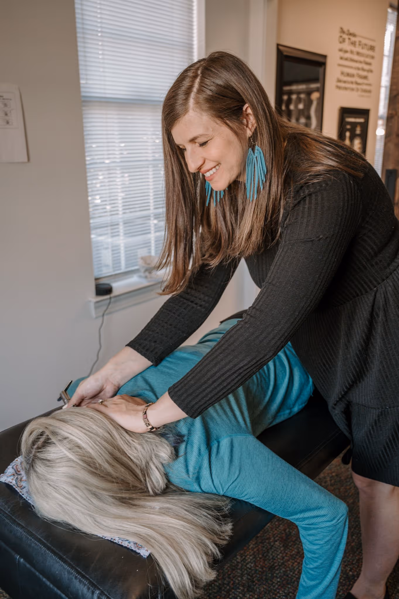 Dr Cait caring for a patient.
