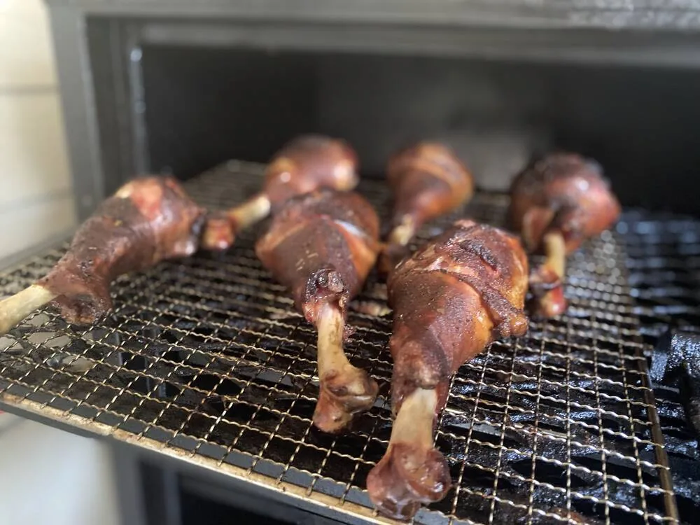 Pongo's pitmaster tending the smoker