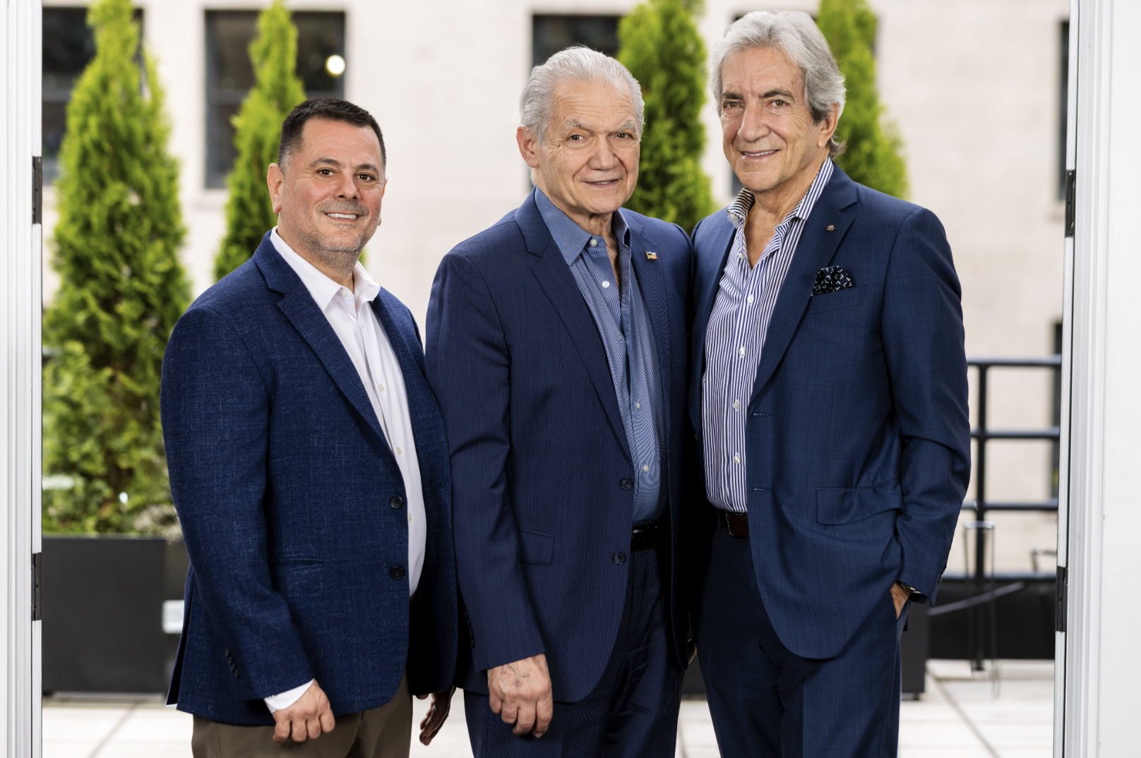 The Pan Brothers Associates team outside the firm's Manhattan office