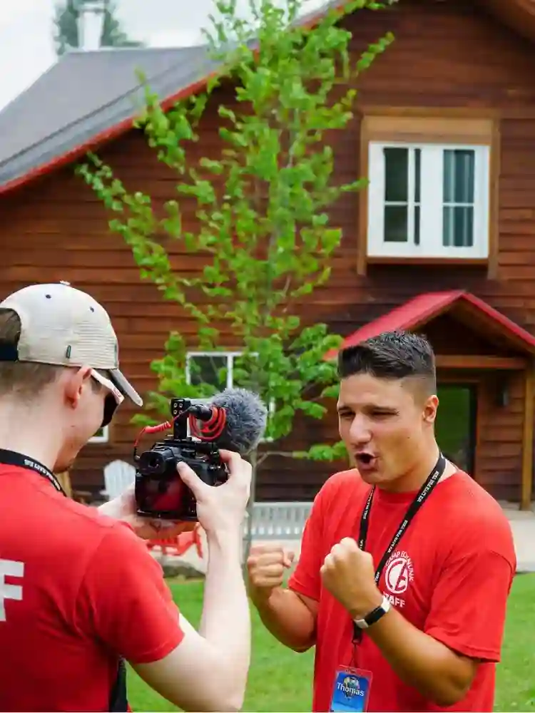 New Zealand student learning photography skills at AmeriCamp summer camp in the USA.